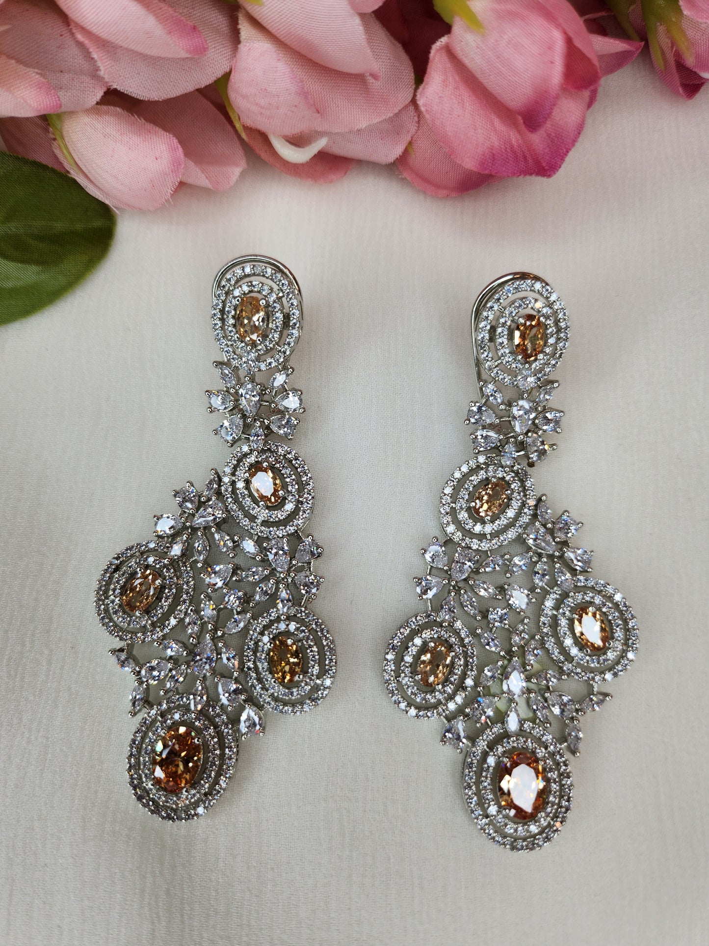 THE BUTTERFLY EFFECT - Chandelier Shape Earrings with peach and zircon stone