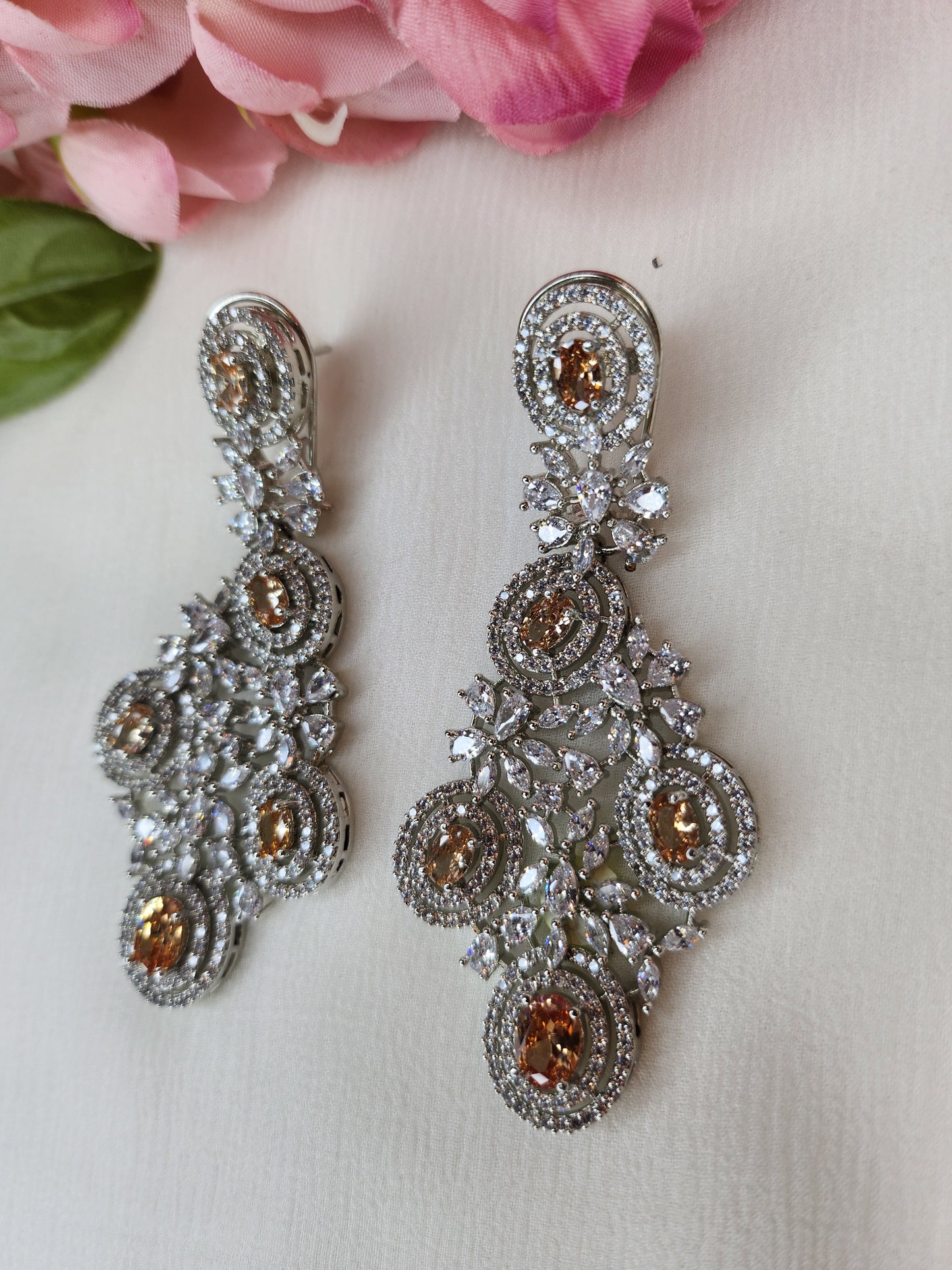 THE BUTTERFLY EFFECT - Chandelier Shape Earrings with peach and zircon stone