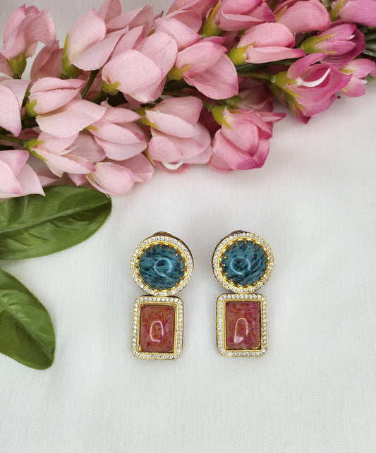 THE BUTTERFLY EFFECT - Earrings with blue and pink stone