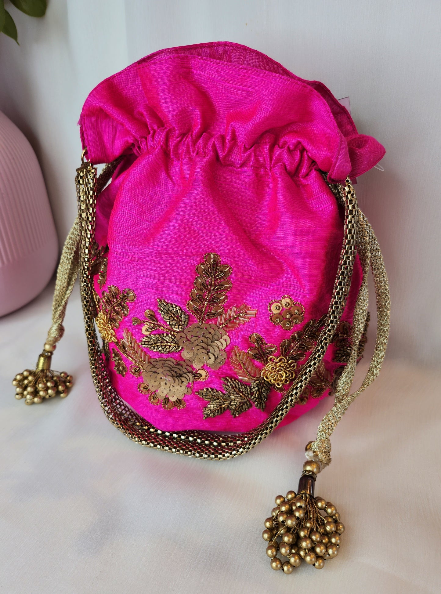 TRUNKLANE - Pink with gold works potli